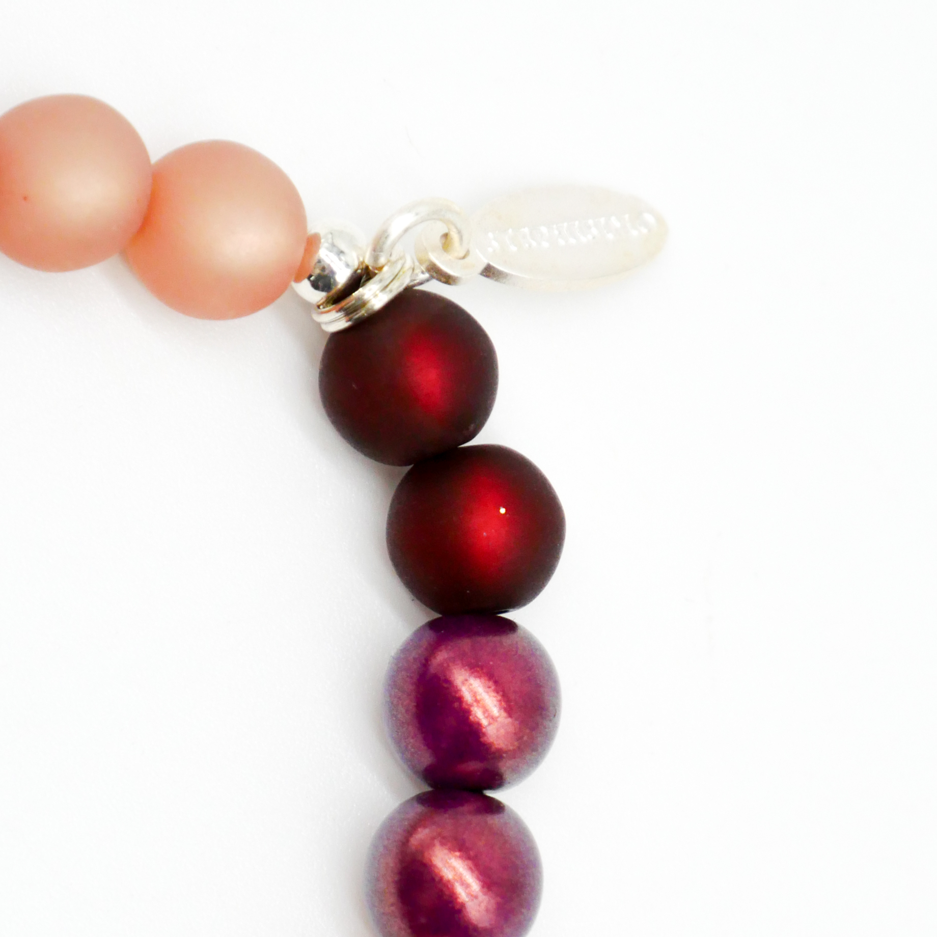  Color Explosion, Armband auf Gummi Ø 8 mm, Glas- und Polaris Perlen, Pluto braun