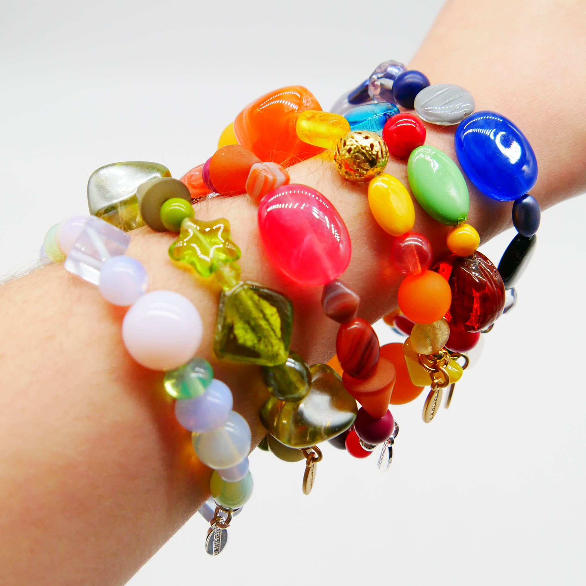 "Summer Feeling", Armband aus verschiedenen Formen, Glas- und Resin Perlen, gelb-orange