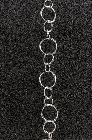 "Charmkette" Gliederkette mit großen gedrehten runden Gliedern, kurz, versilbert ca. 60cm
