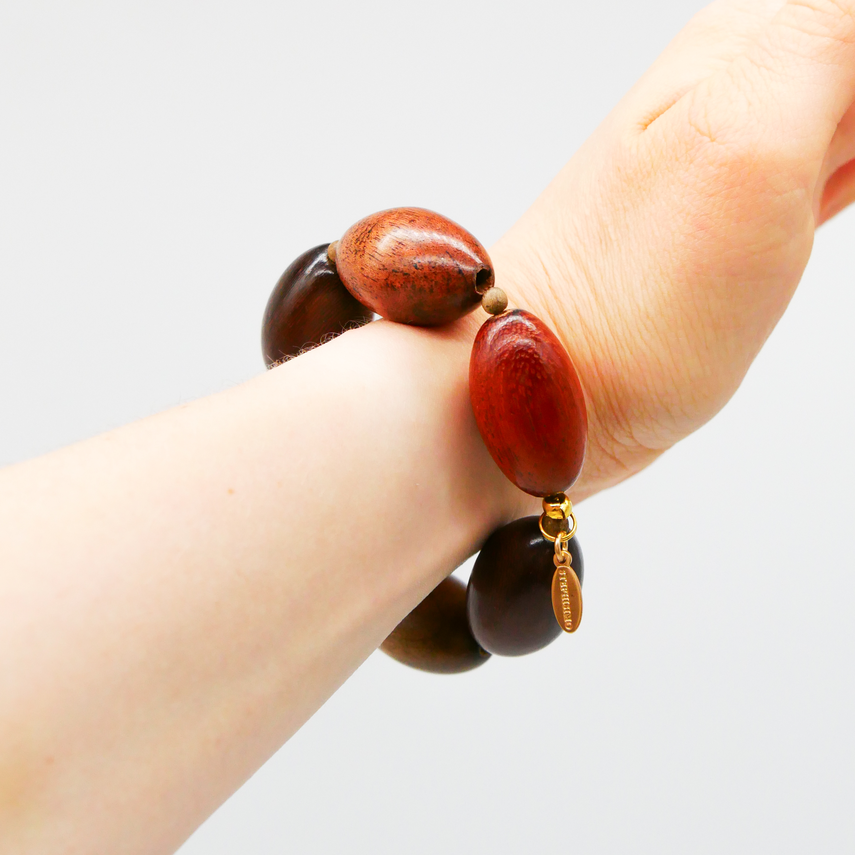 "Woodland" Armband auf Gummi "Olive", Holzolive, Roble, Bayong, Kamagong, Greywood "Woodland" Armband auf Gummi "Olive", Holzolive, Roble, Bayong, Kamagong, Greywood