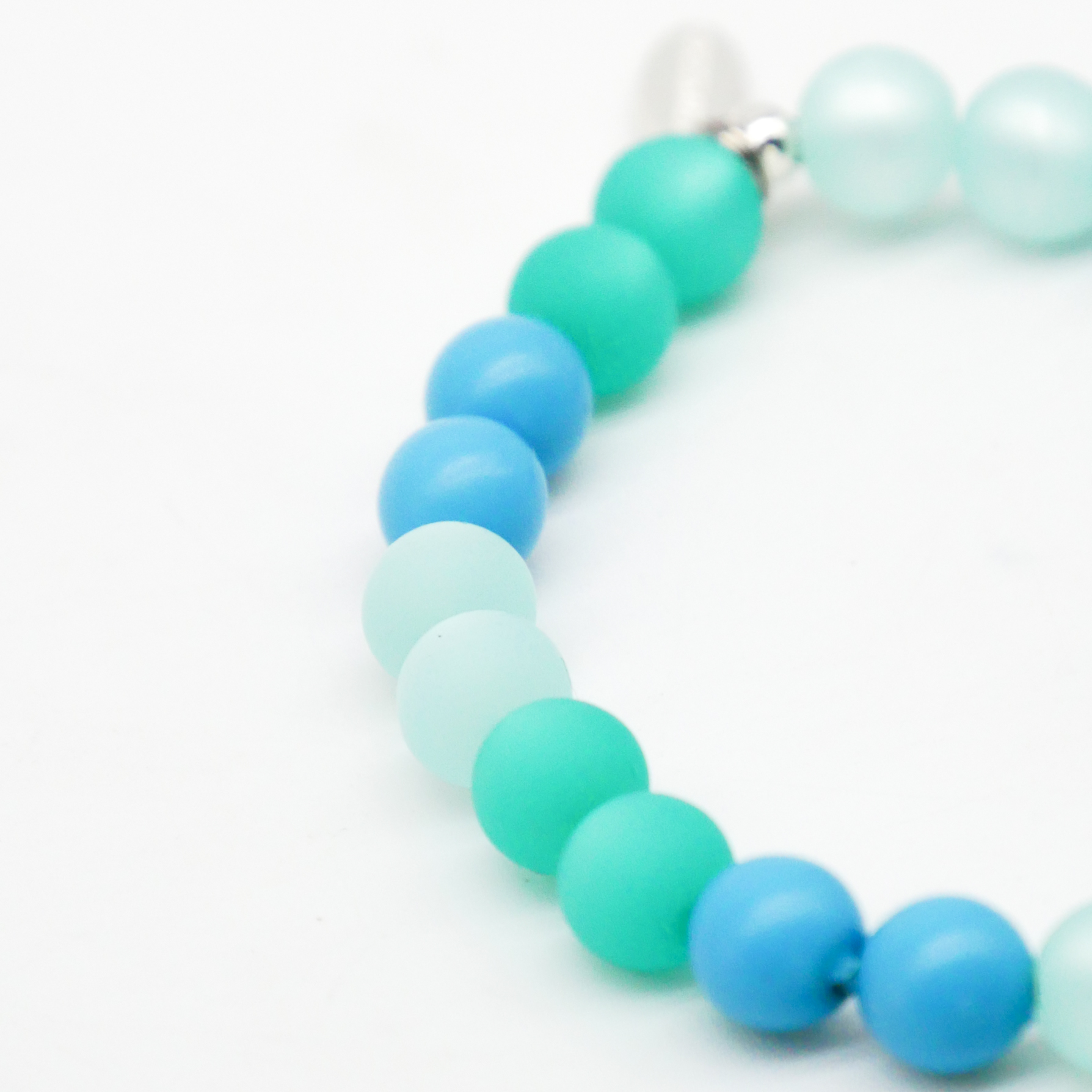  Color Explosion, Armband auf Gummi Ø 8 mm, Glas- und Polaris Perlen, Neptun türkis