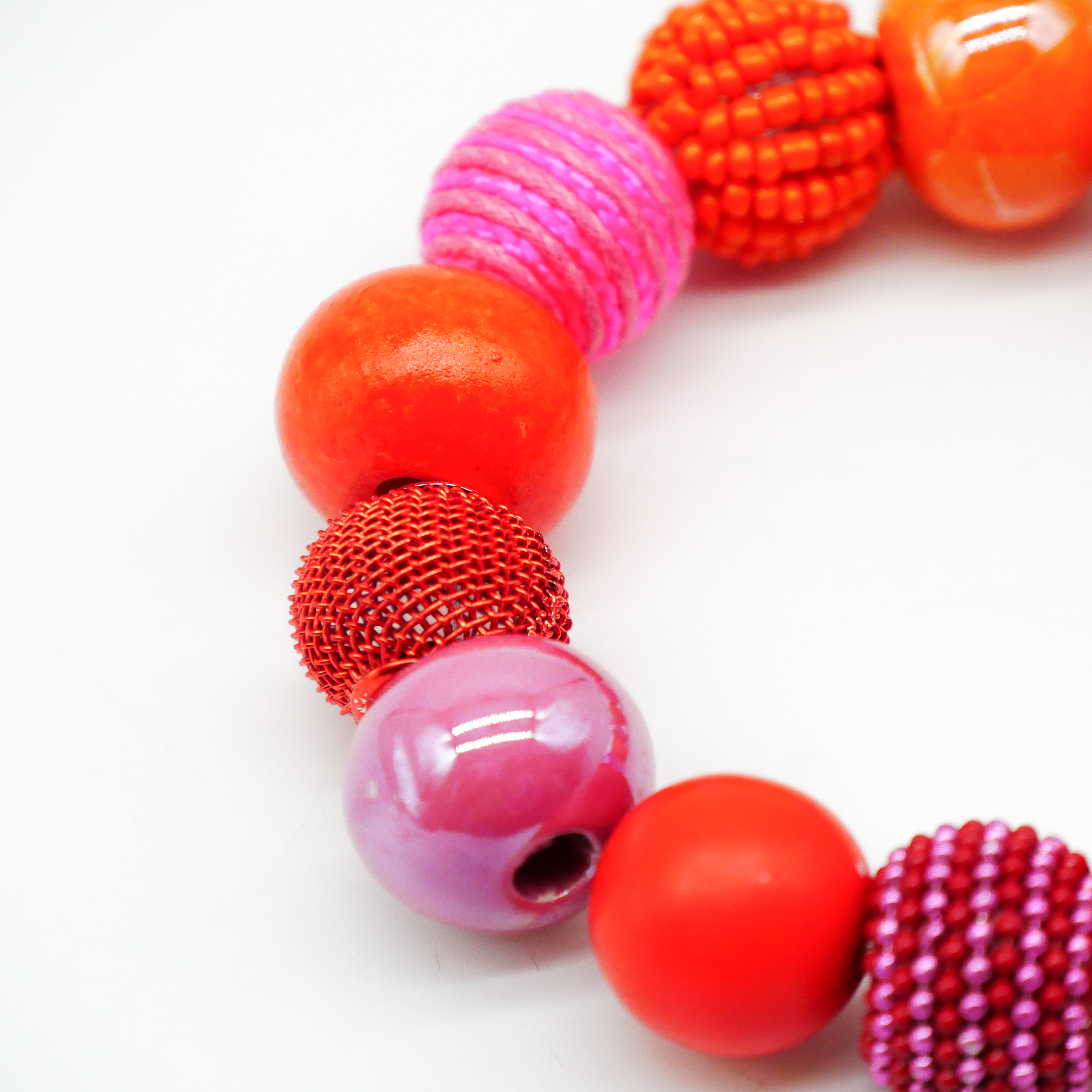  "Bollywood" Armband auf Gummi, pink-orange