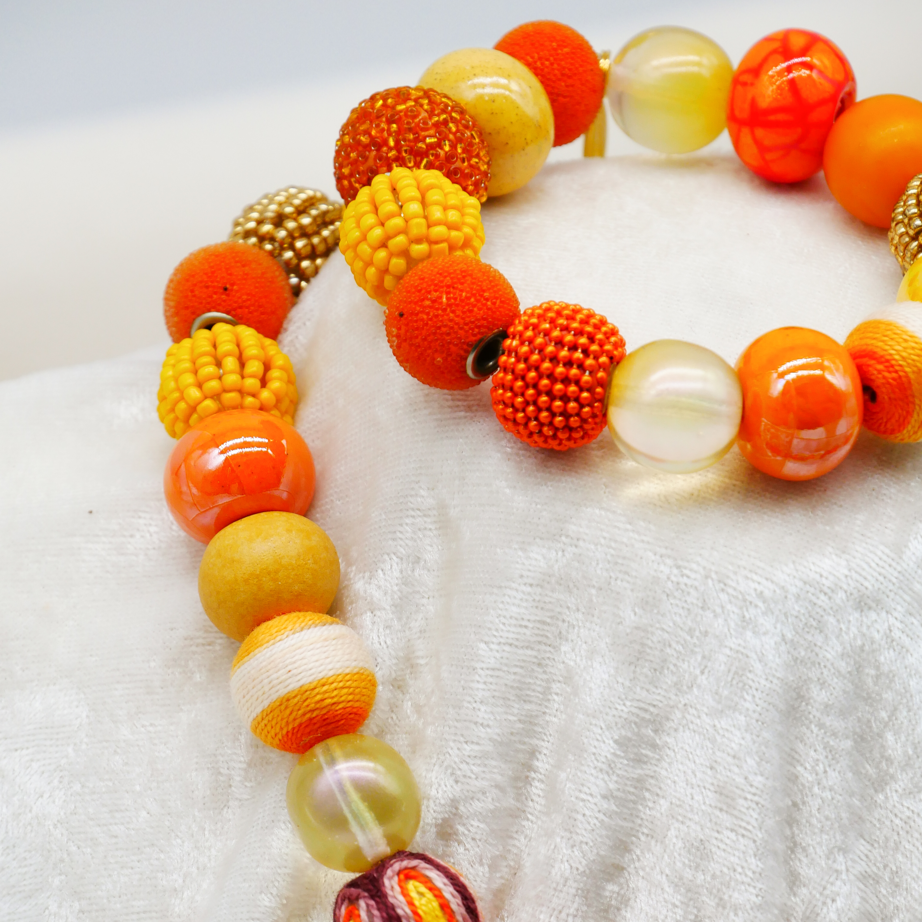  "Bollywood" Armband auf Gummi, gelb-orange