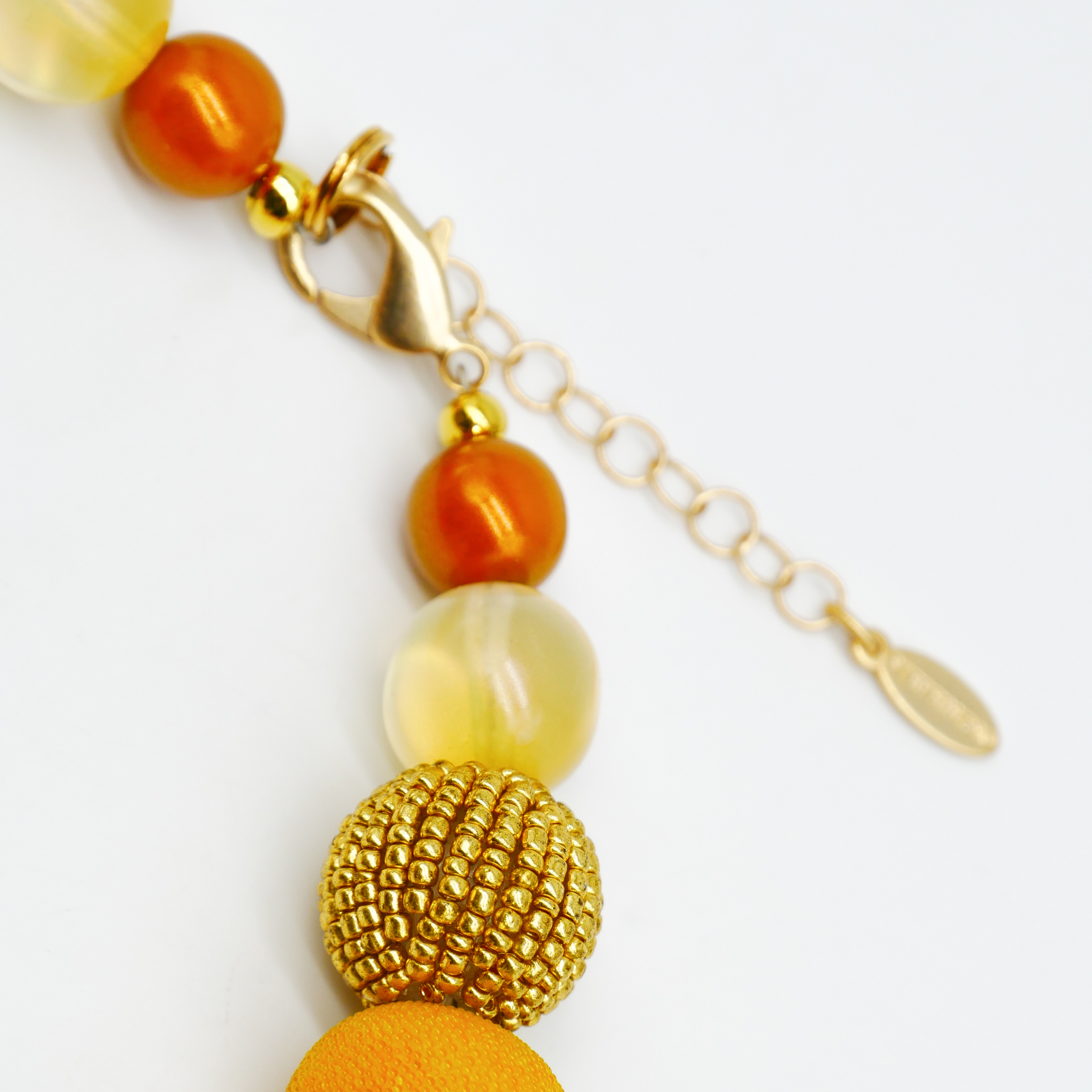 "Bollywood" Kette Ø ca. 20 mm, gelb-orange