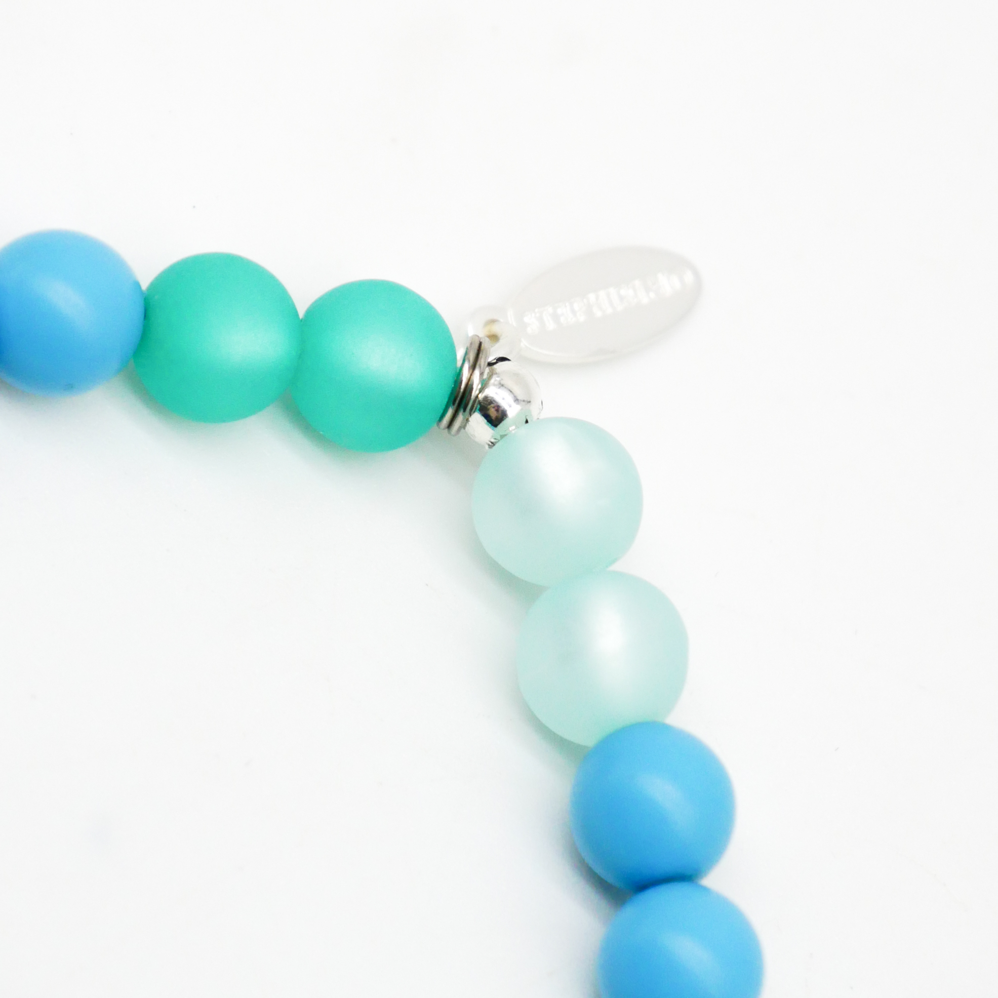  Color Explosion, Armband auf Gummi Ø 8 mm, Glas- und Polaris Perlen, Neptun türkis